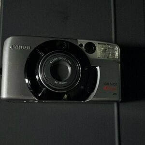 canon sure shot 105 zoom *point and shoot camera*